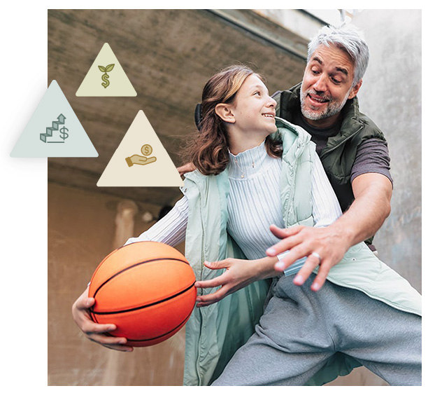 man and daughter playing basketball